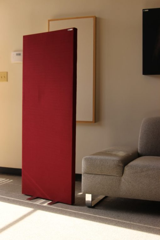 freestand acoustic panel in room with couch