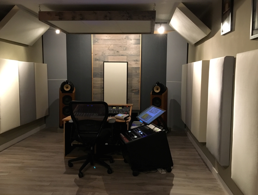 Bass Traps Tri Traps and hanging cloud panels by GIK Acoustics in Sun Room Audio Mastering Studio head on