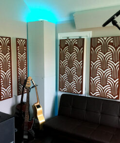 Home recording studio ideas with GIK Acoustics Impression series acoustic panels and white soffit bass traps and couch